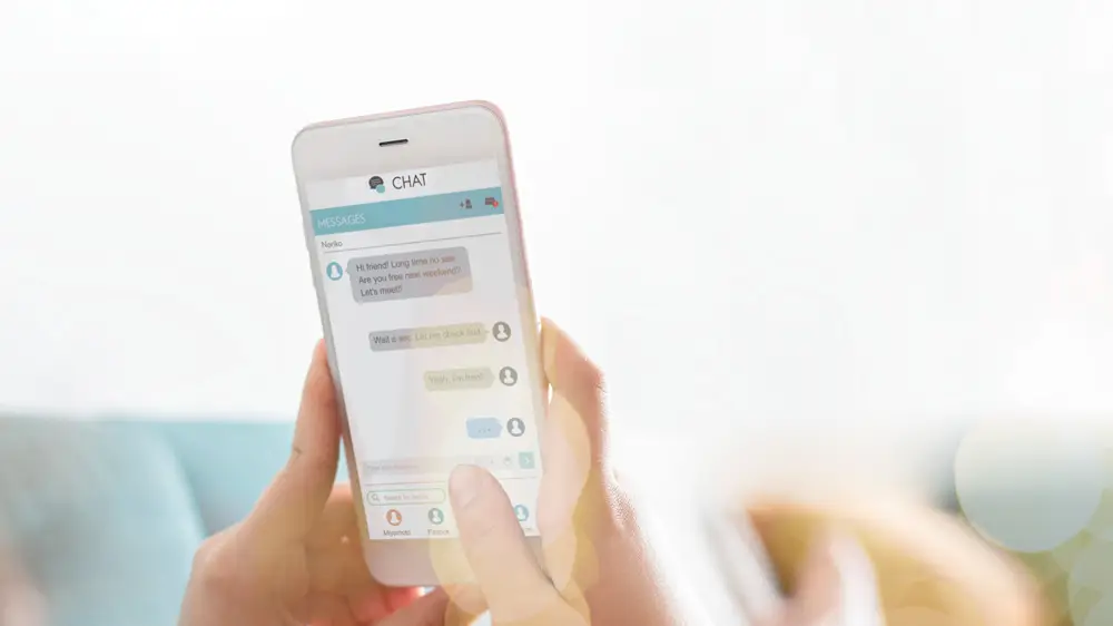 Conversa entre humano e chatbot. Os chatbots para empresas podem ser usados em diversas finalidades