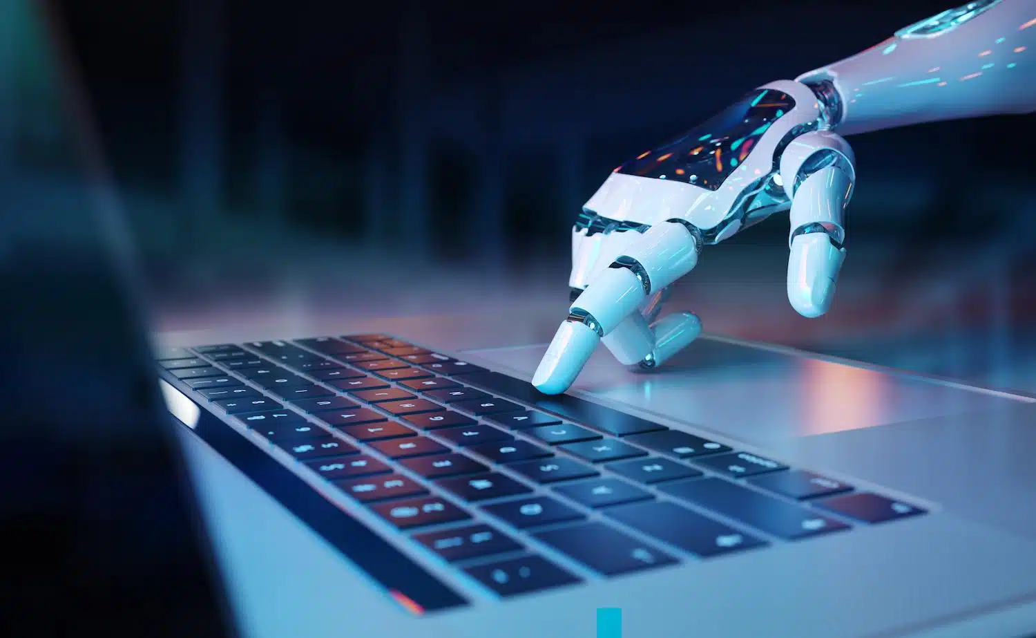 M&atilde;o rob&oacute;tica mexendo em computador, representando a possibilidade de conversar com bot.